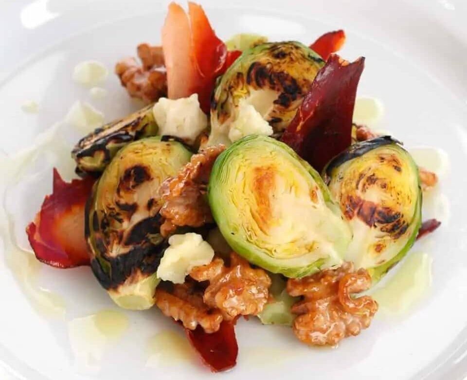 Grilled Brussel Sprout Salad w/ Walnuts, Prosciutto & Parmesan - Chef’s Pencil